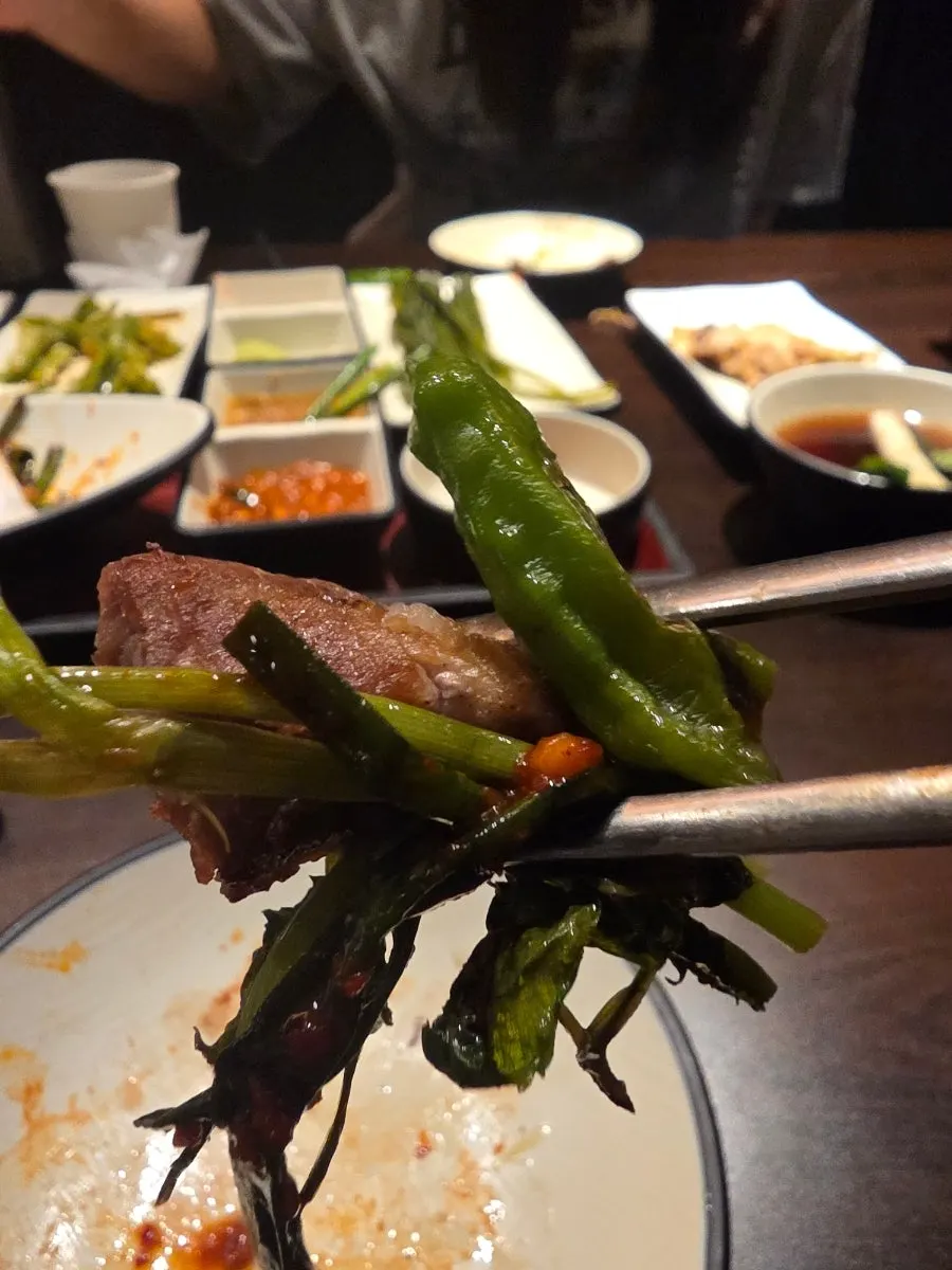 Variety of meat side dishes arranged on the table