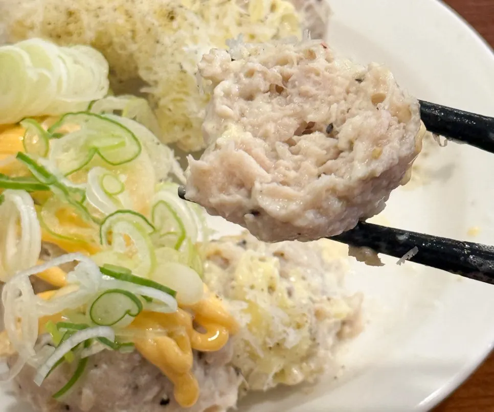 Assorted tsukune cut with chopsticks