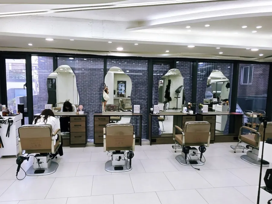 White-and-wood hair salon interior