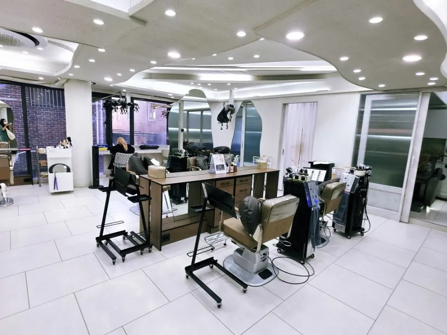 Curved mirrors and marble-floor interior