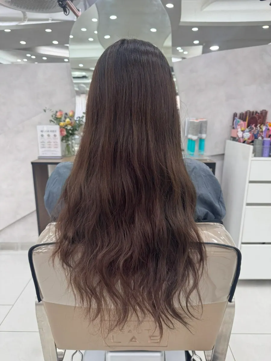 Long hair before a high-layered perm