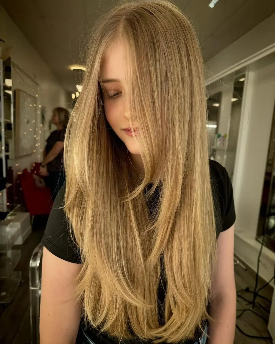 Damaged hair before a high-layered perm