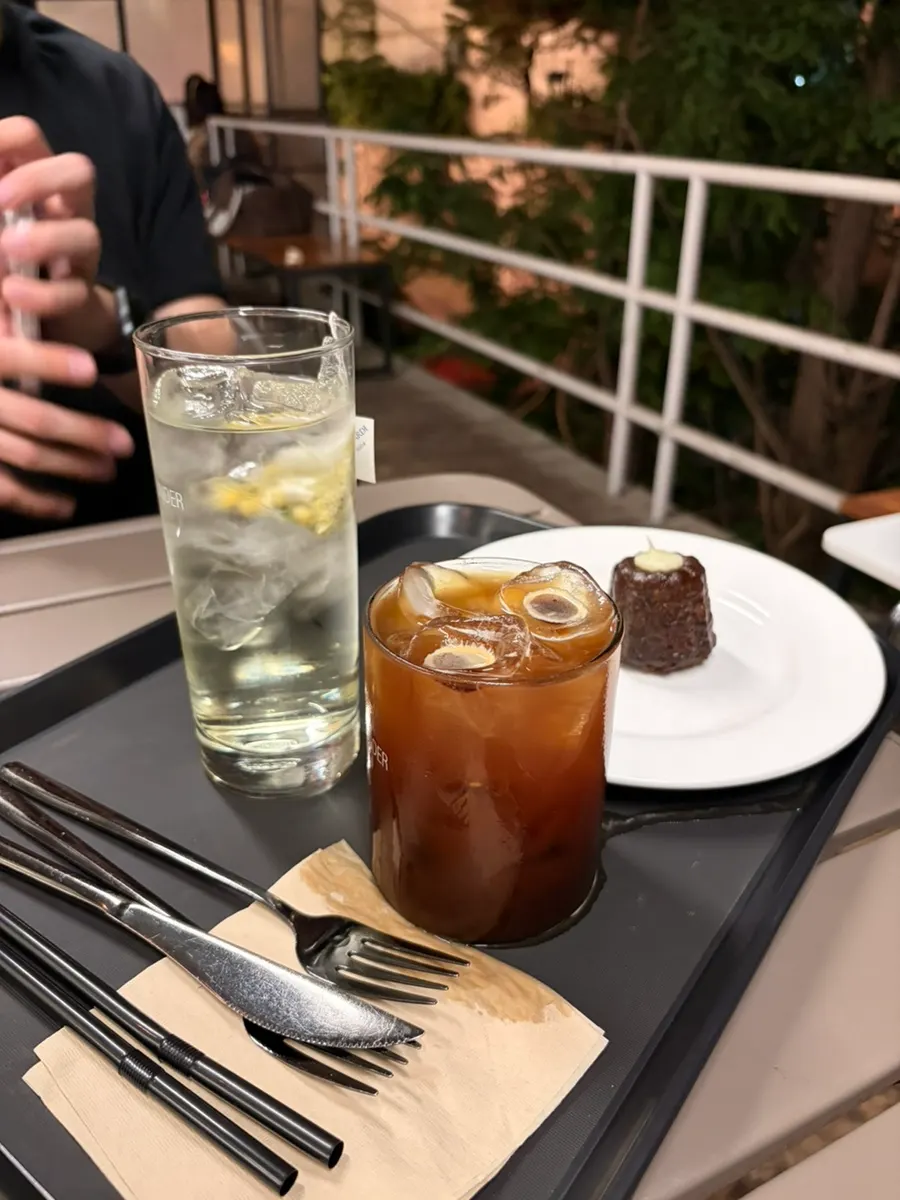 A glass of iced americano at Upper and Under