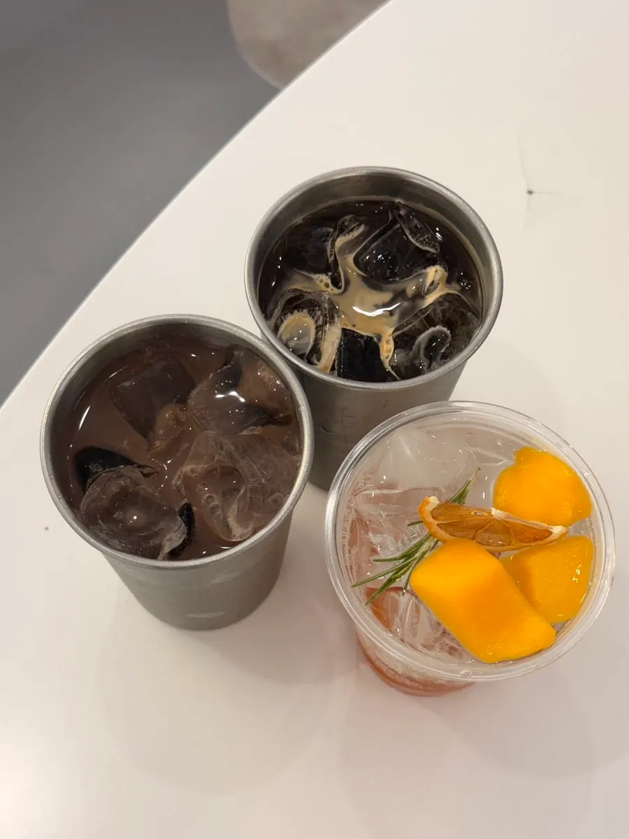 Chocolate latte, mango ade, and Americano