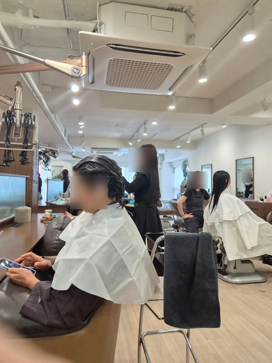 Applying perm solution and heat processing