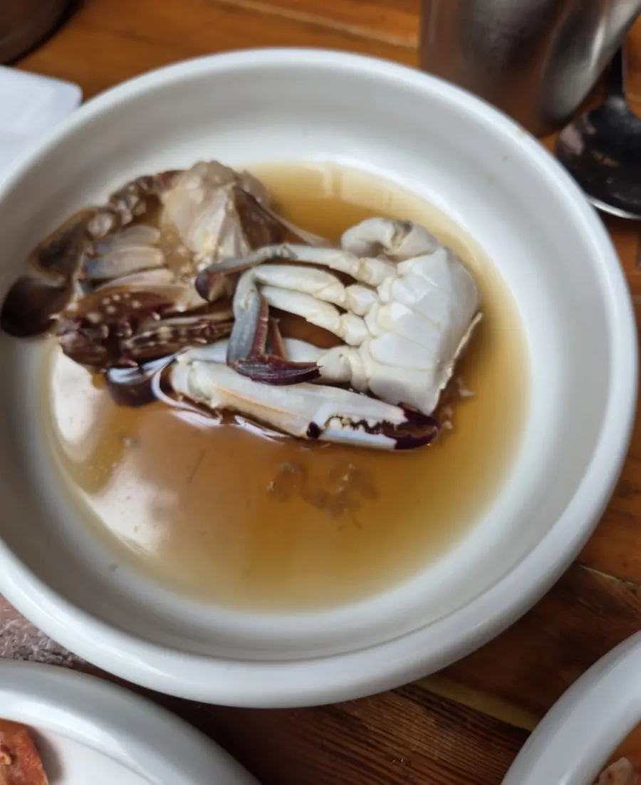 Soy-marinated crab served as a basic side dish at Bongu Hwarro