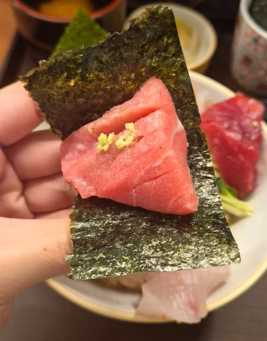 Sashimi rice bowl with baek kimchi and seaweed