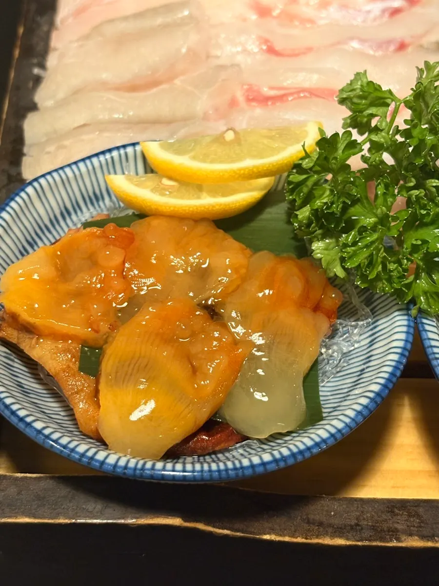 Sashimi thought to be sea bream, halibut, and rockfish