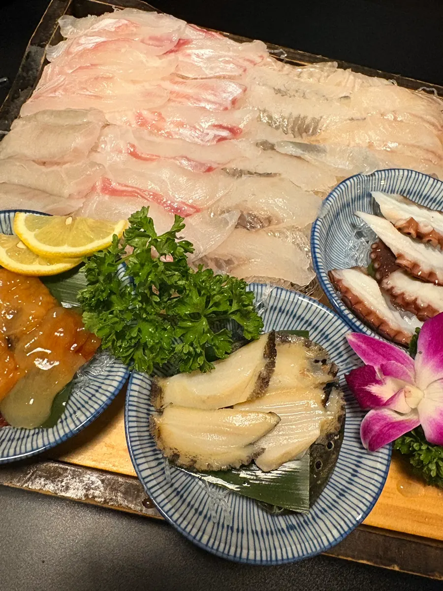 Soy-marinated shrimp with blanched octopus, abalone, and whelk