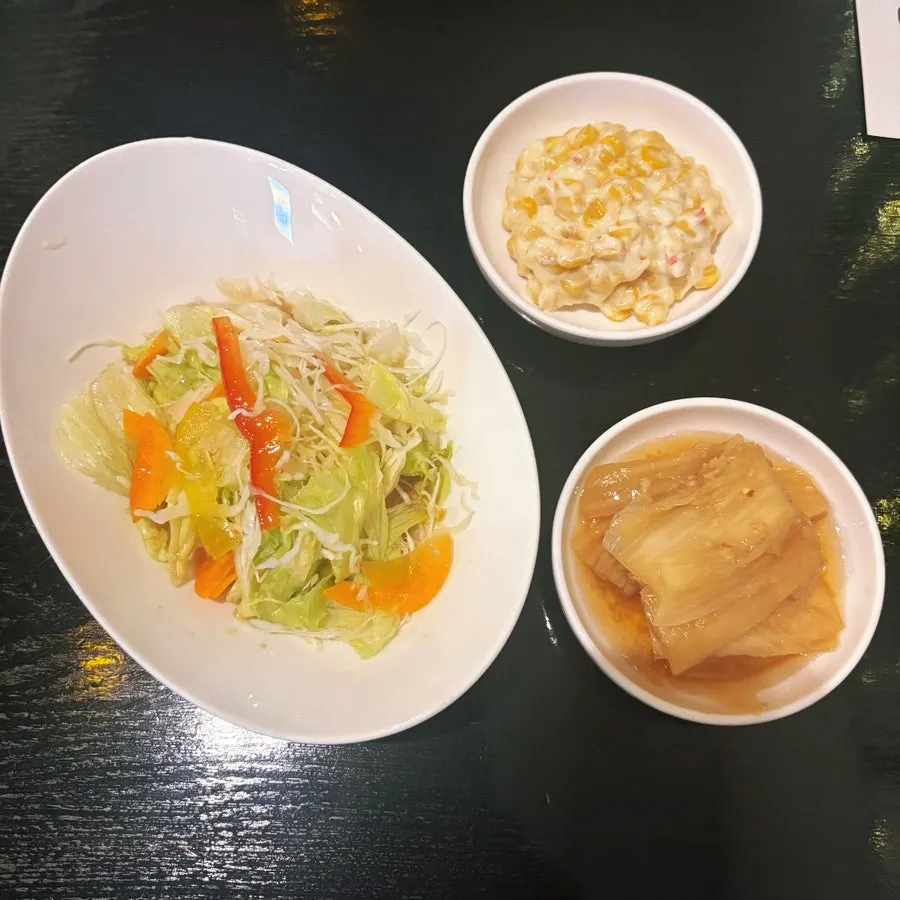 Side-dish spread for the live-fish sashimi set