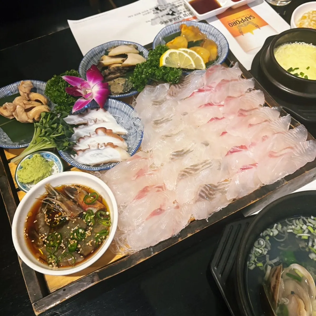Live-fish sashimi set with flounder, sea bream, and fluke