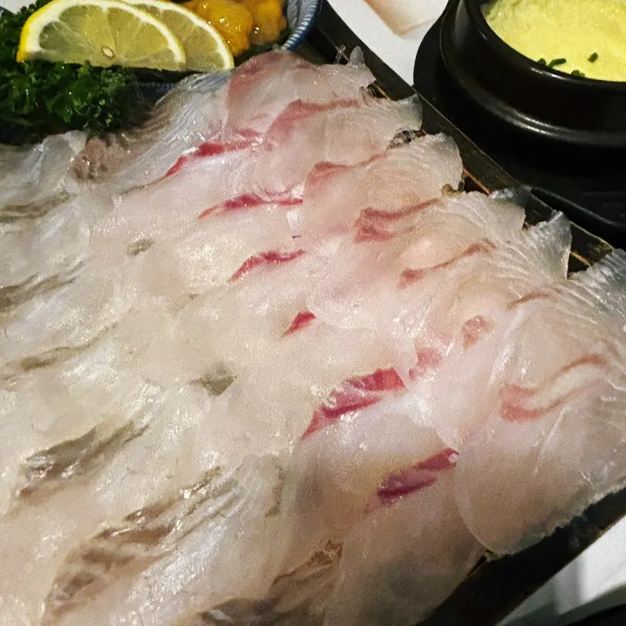 Damiseon live-fish sashimi set spread