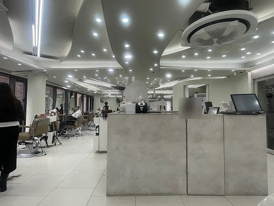 Interior of the salon decorated in white tones