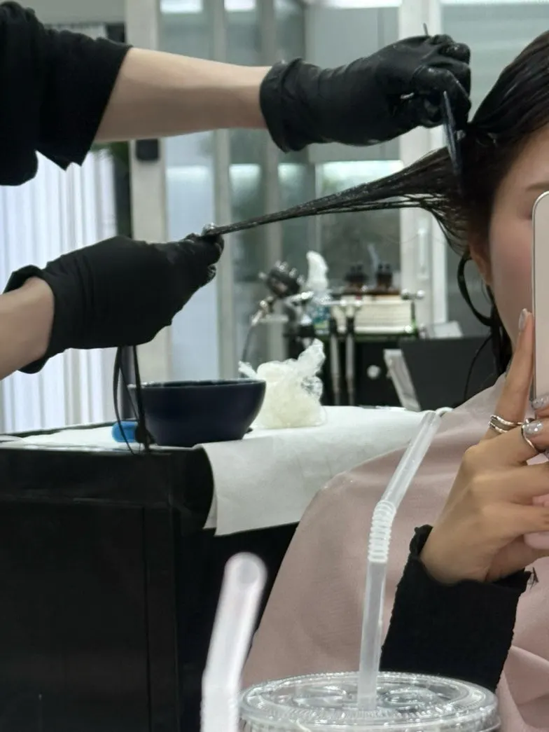 Product being applied during the Shiseido salon clinic