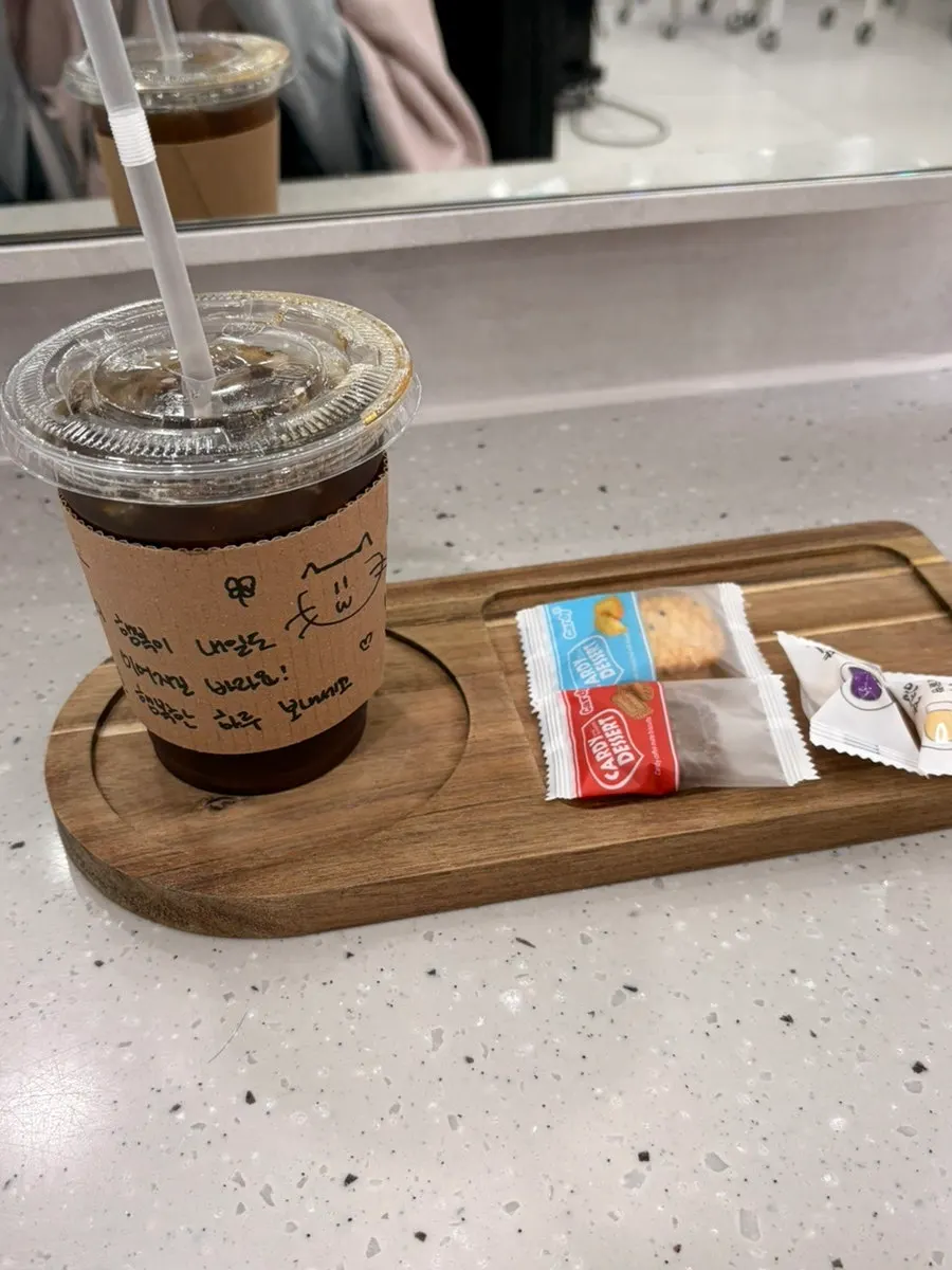 Coffee and snacks with a handwritten note