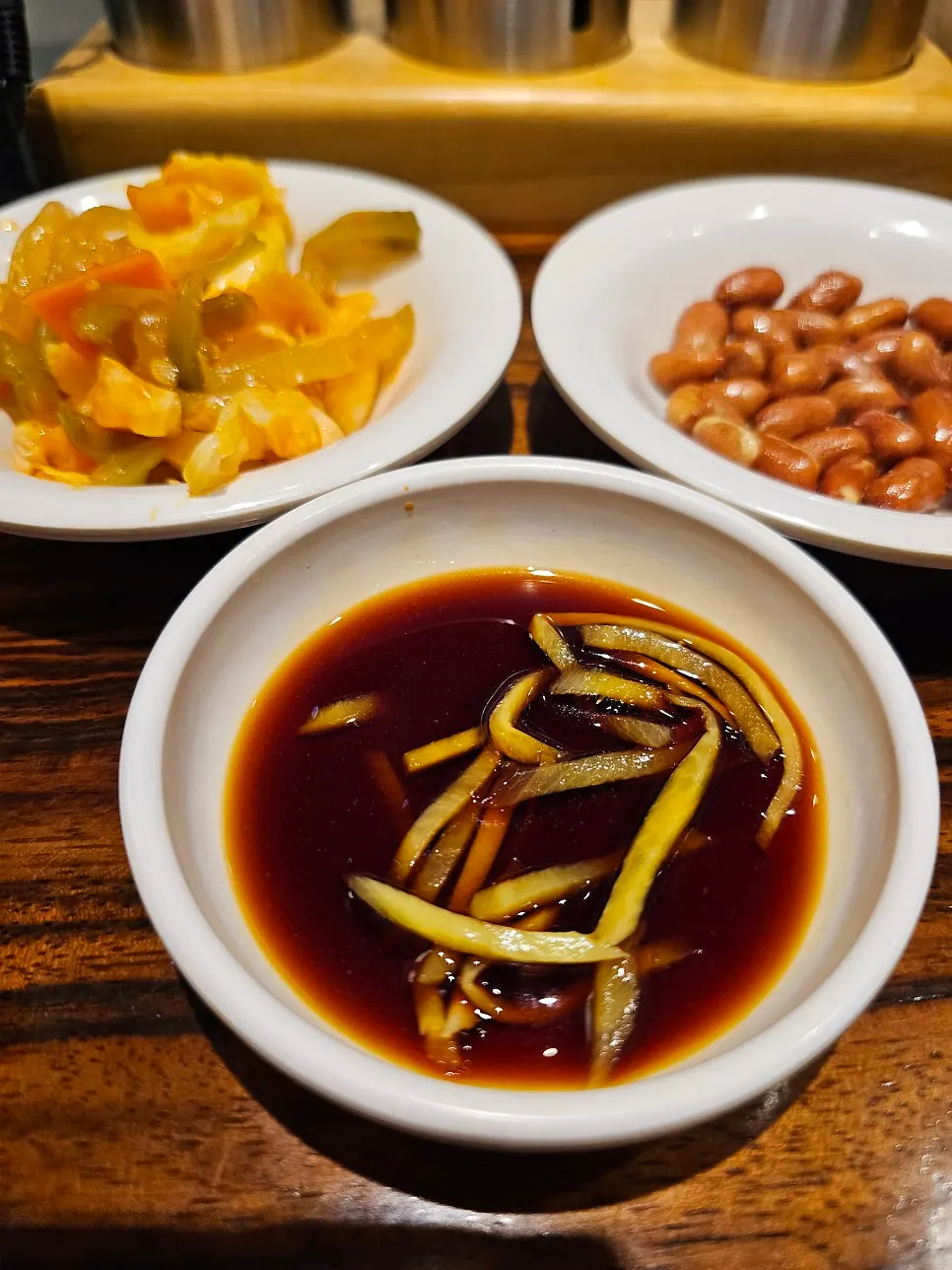 Solo table at Sinbok Myeongwan set with complimentary side dishes