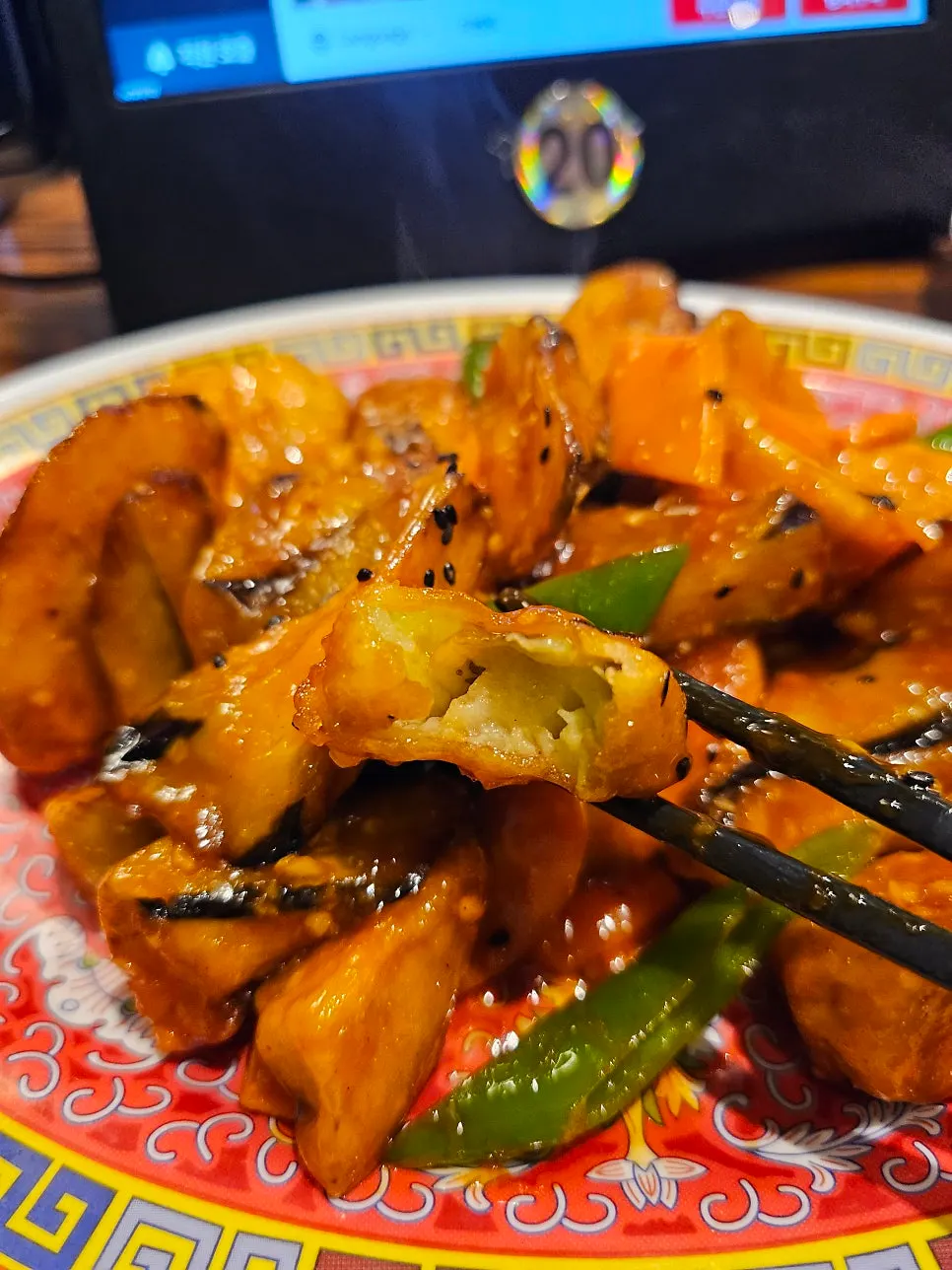 Fried eggplant coated moistly in sauce