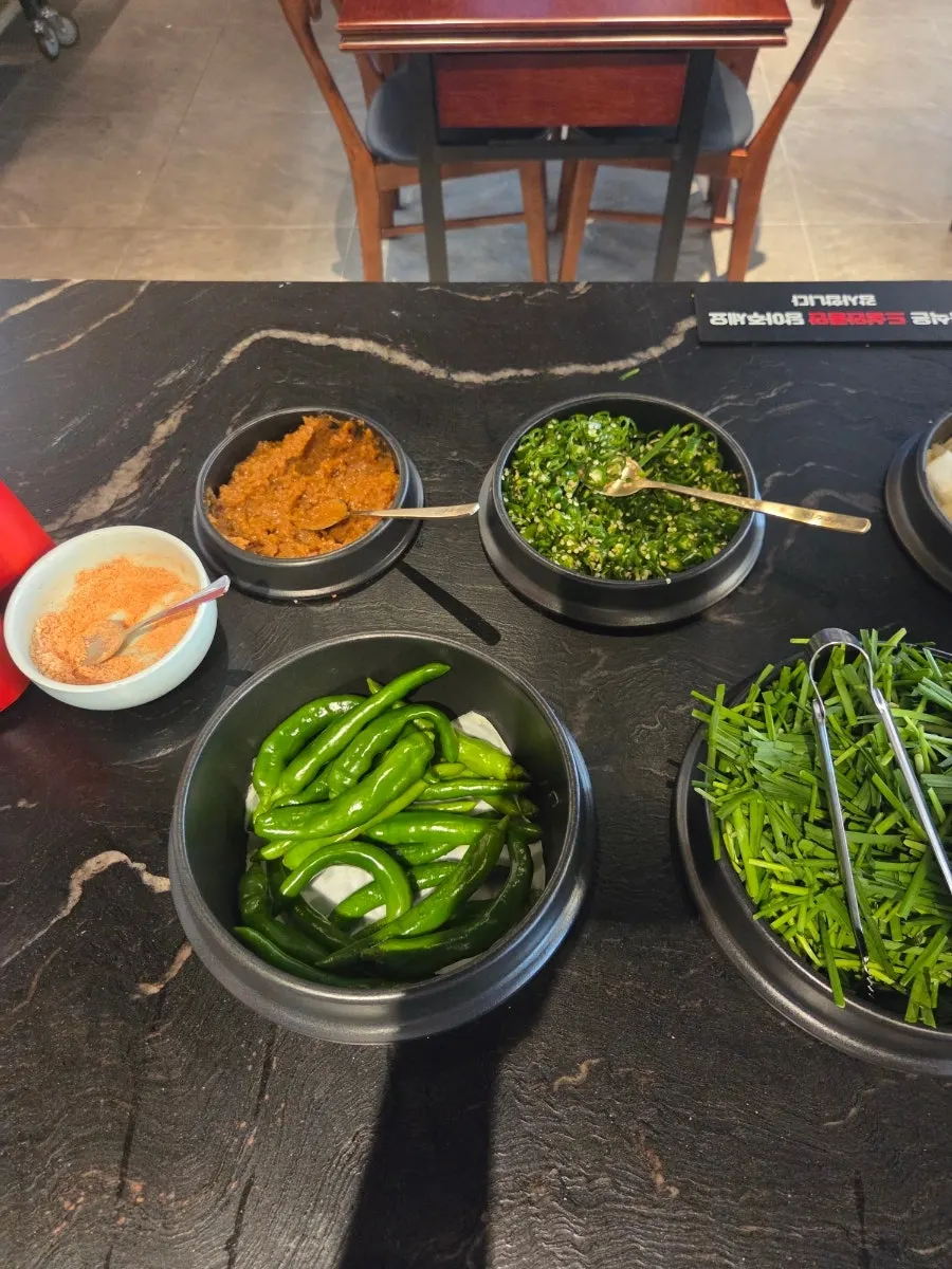 Kimchi varieties at the self-serve bar