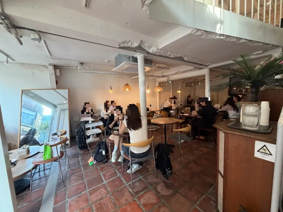 View of indoor seating on one of the café's floors