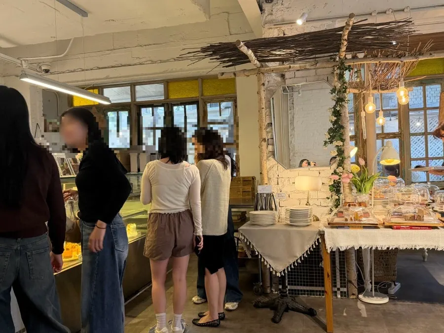 Café interior with large tables