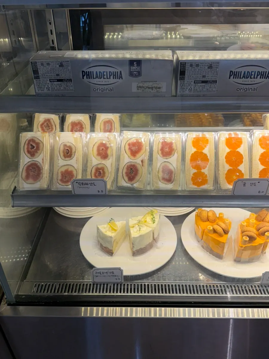 Showcase filled with slice cakes
