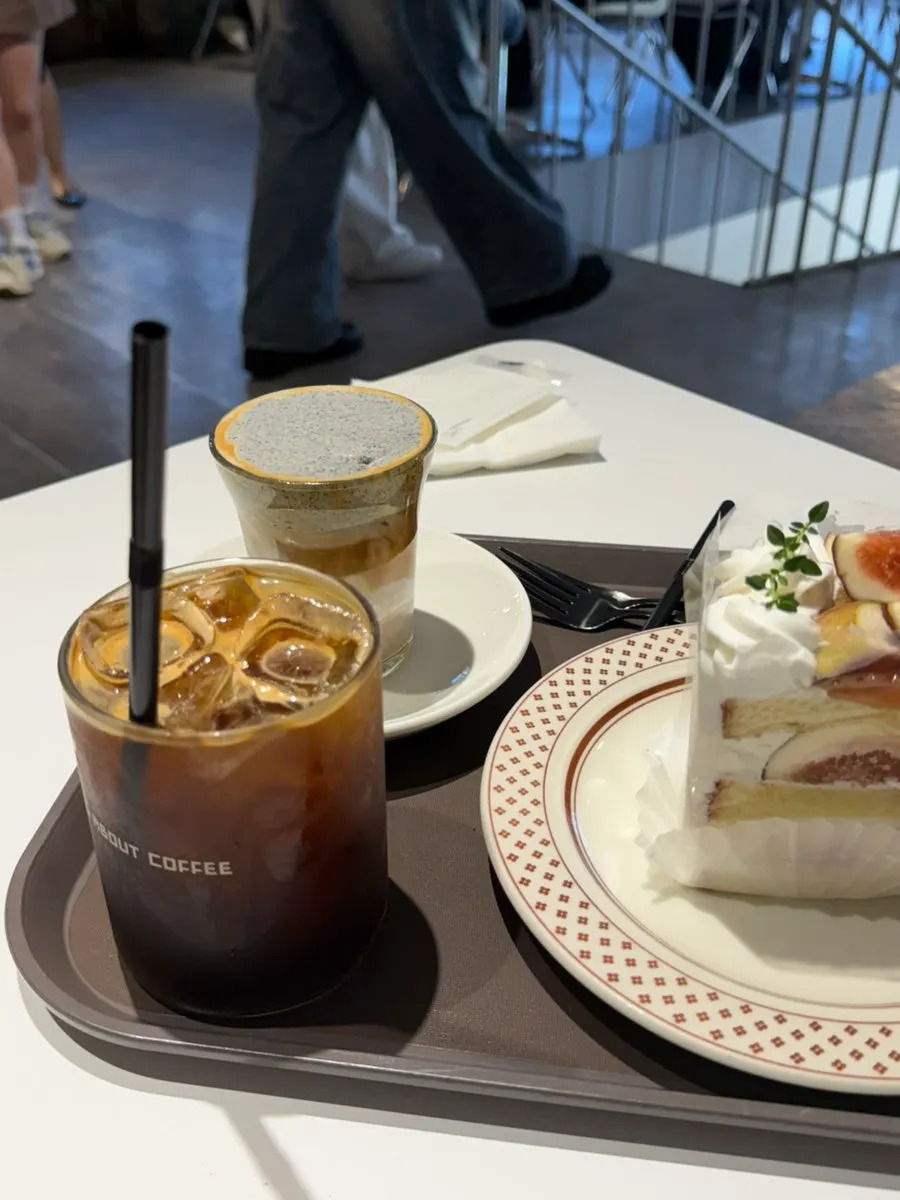 Black sesame cream latte topped with a thick layer of cream