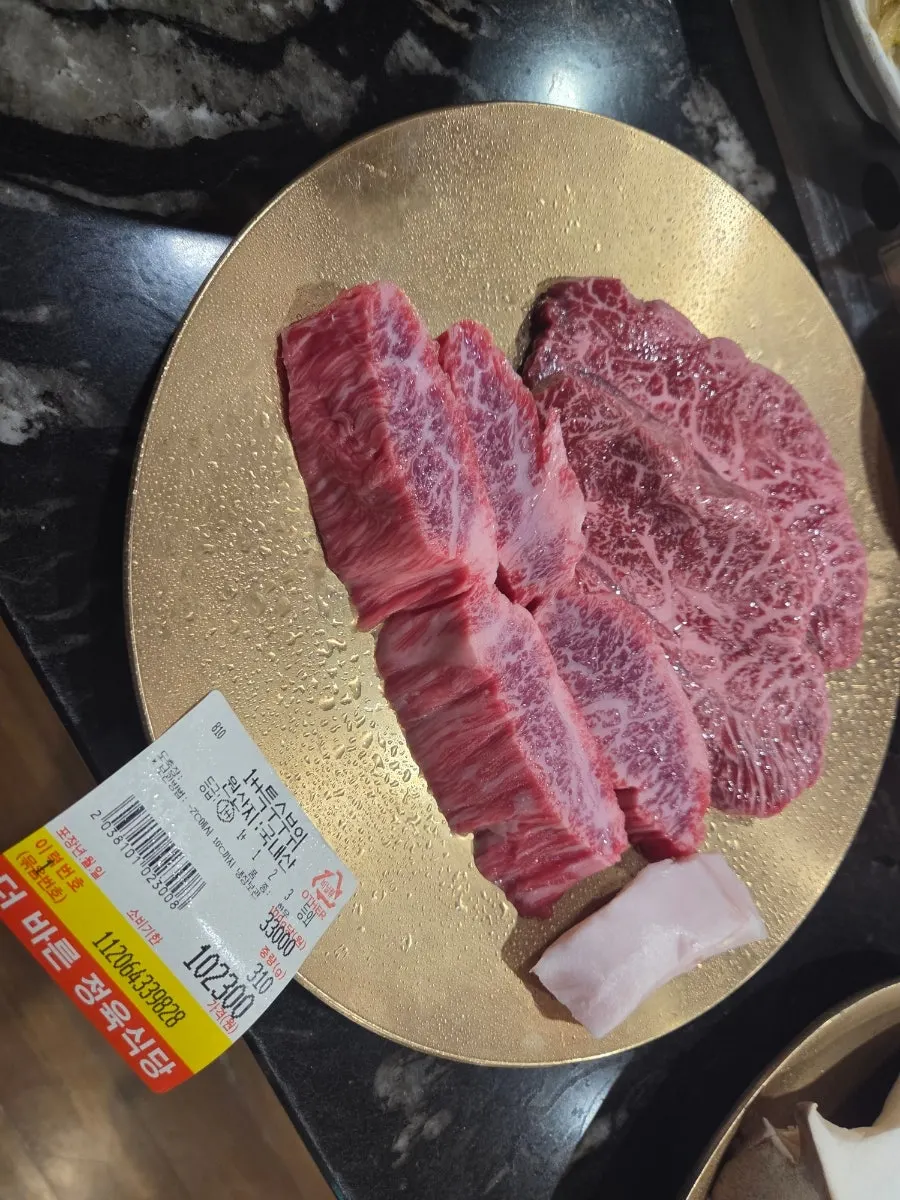 Hanwoo grilling over charcoal