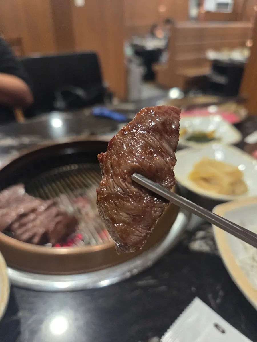 A piece of hanwoo grilled by staff
