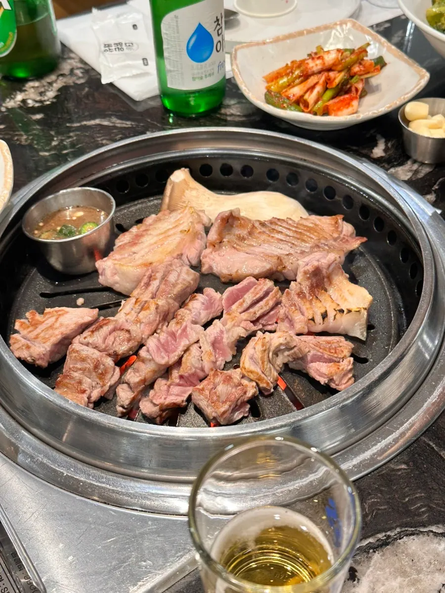 A thick piece of pork picked up with chopsticks