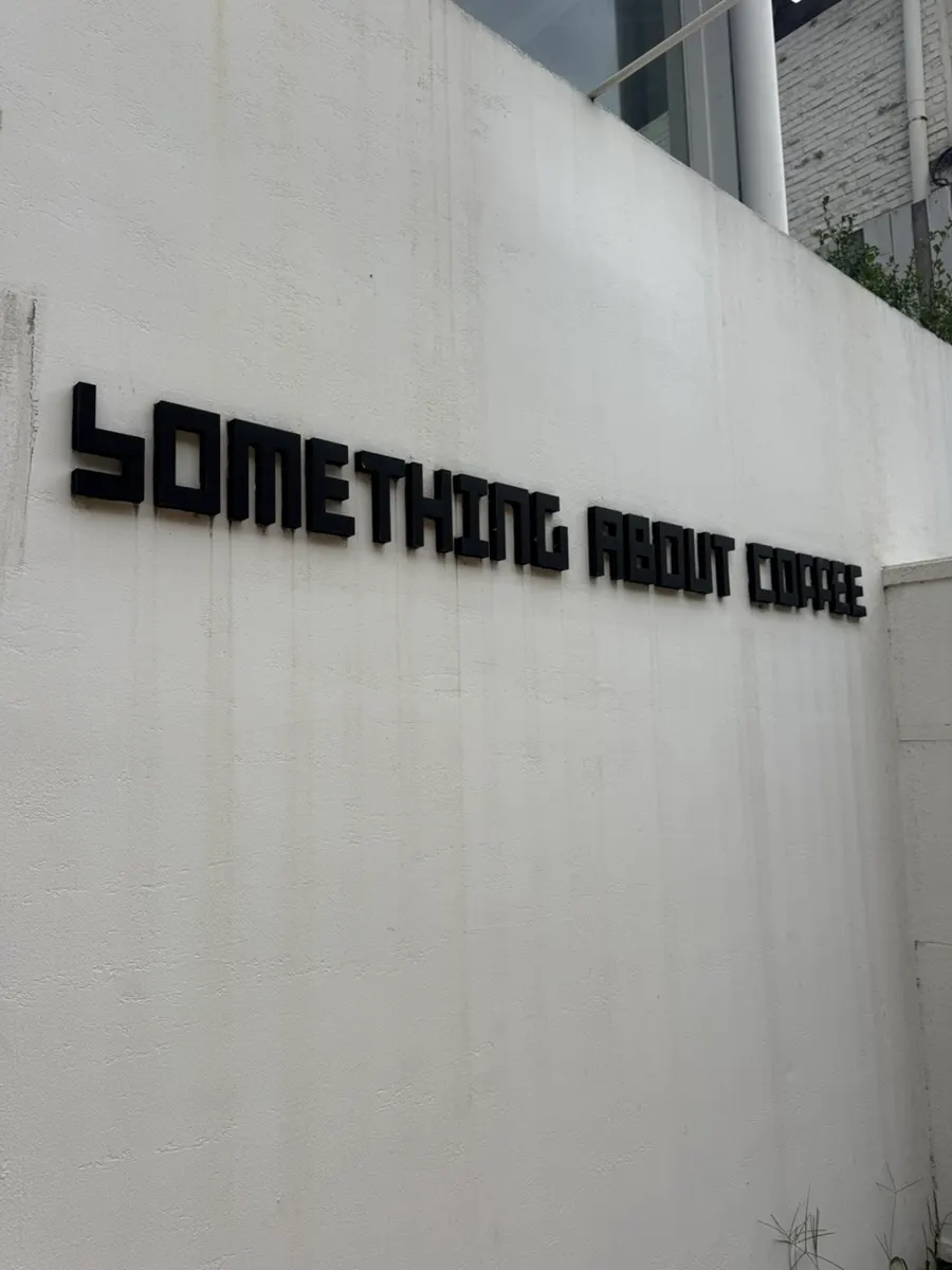 Exterior of Something About Coffee and the surrounding street