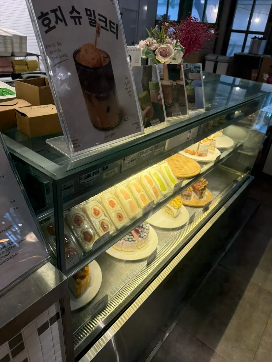 Café menu display showing sandwich options