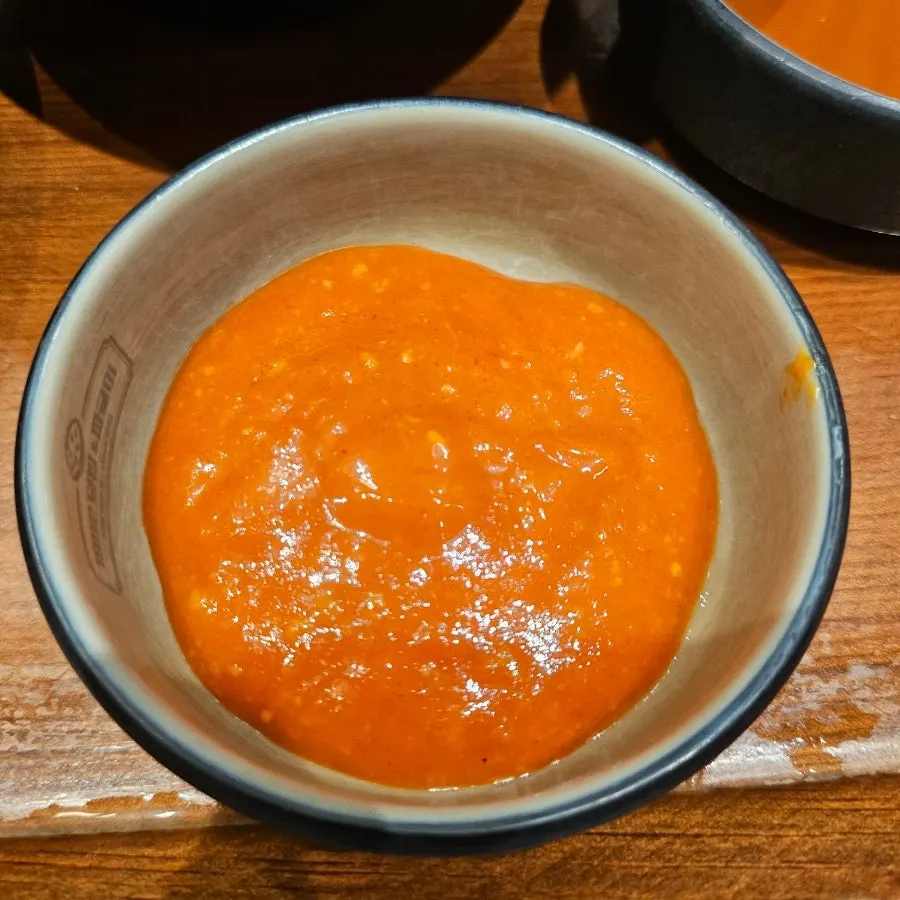 Sesame dipping sauce sealed in a plastic pouch