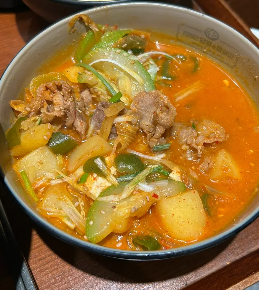 Mini doenjang jjageuli with beef brisket, potato, and zucchini