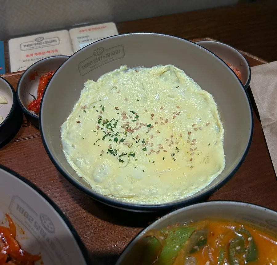 Fluffy steamed egg served as a standard side