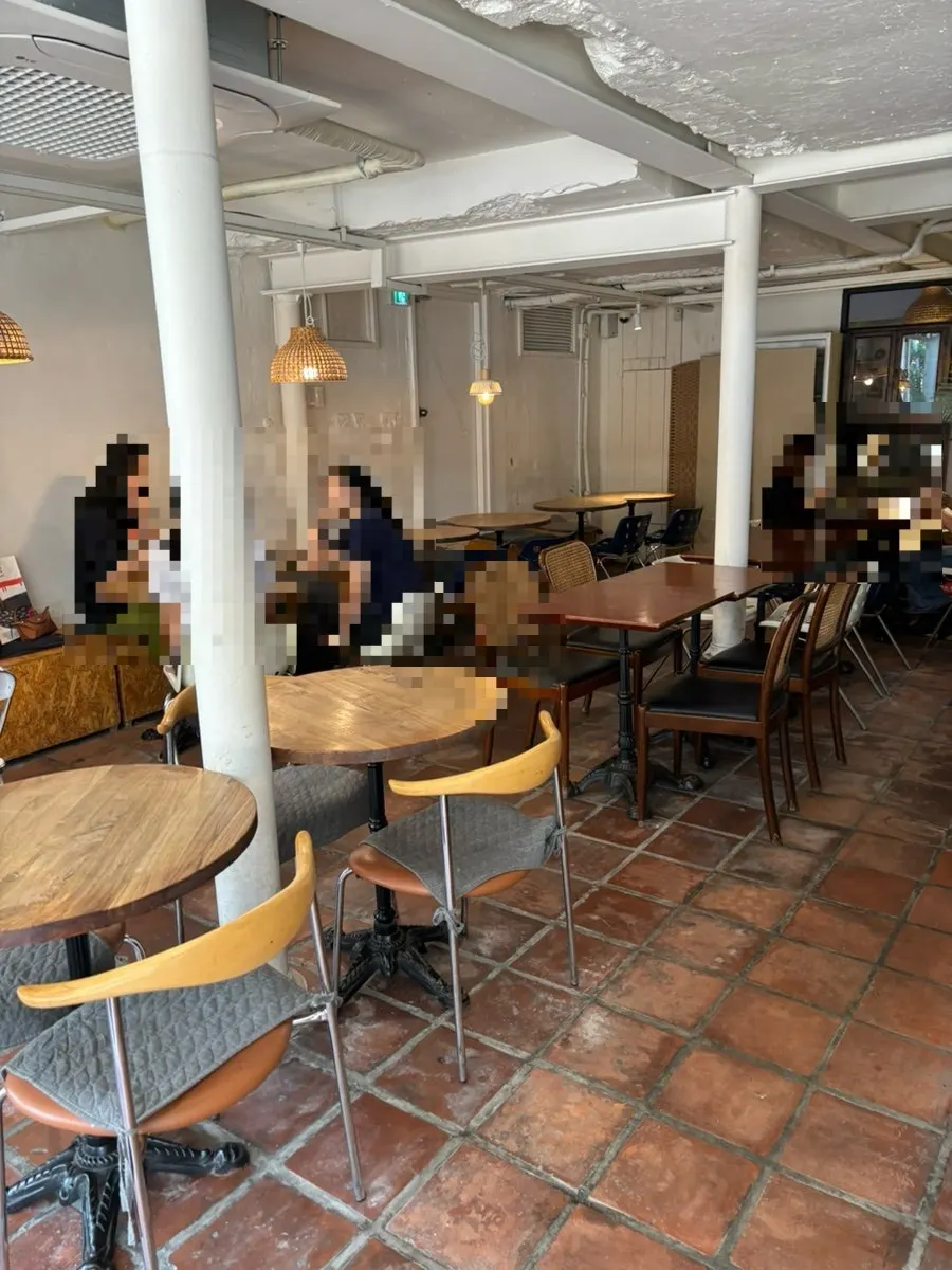 Spacious interior of Something About Coffee