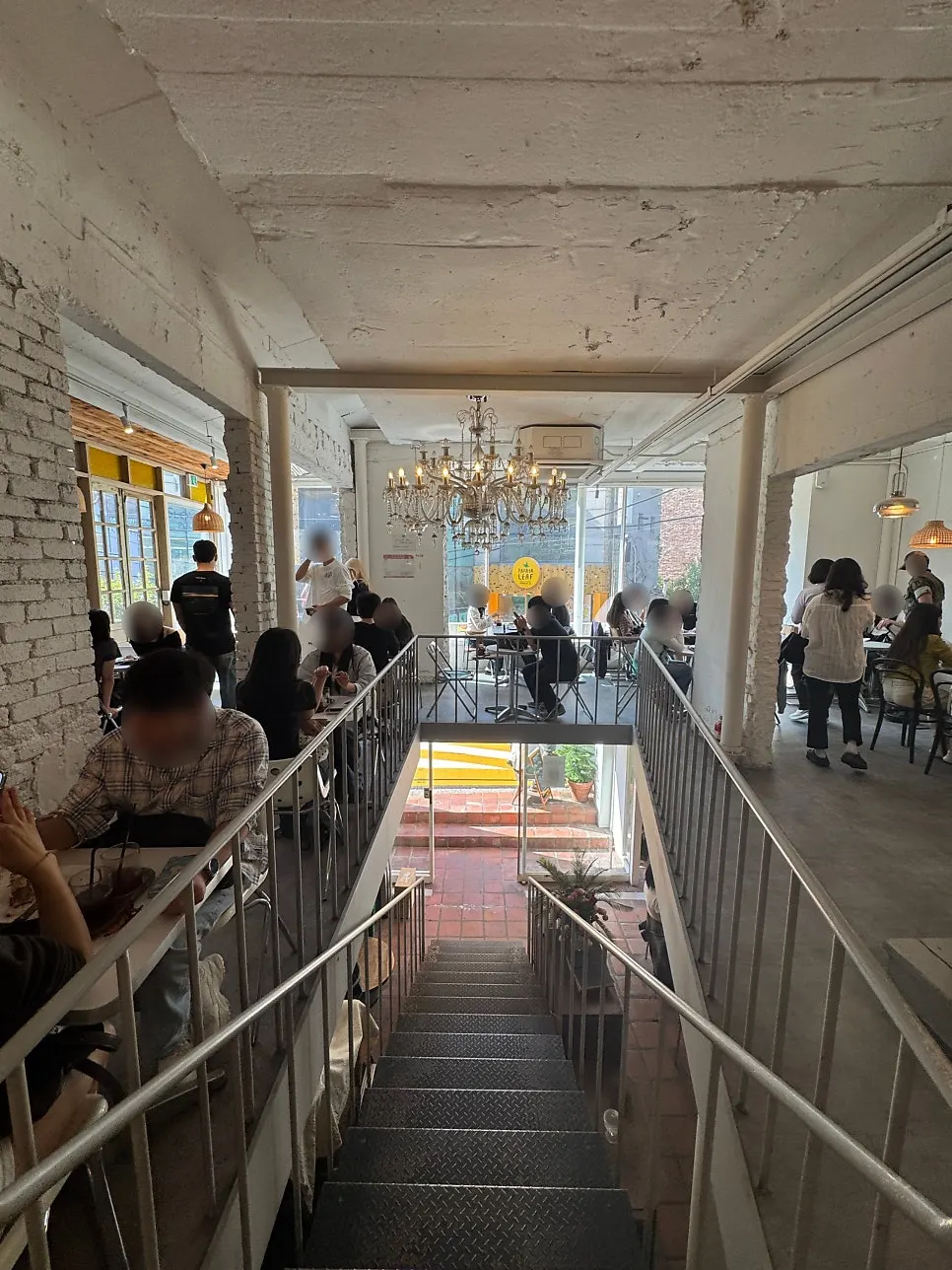 1st-floor table seating at Something About Coffee