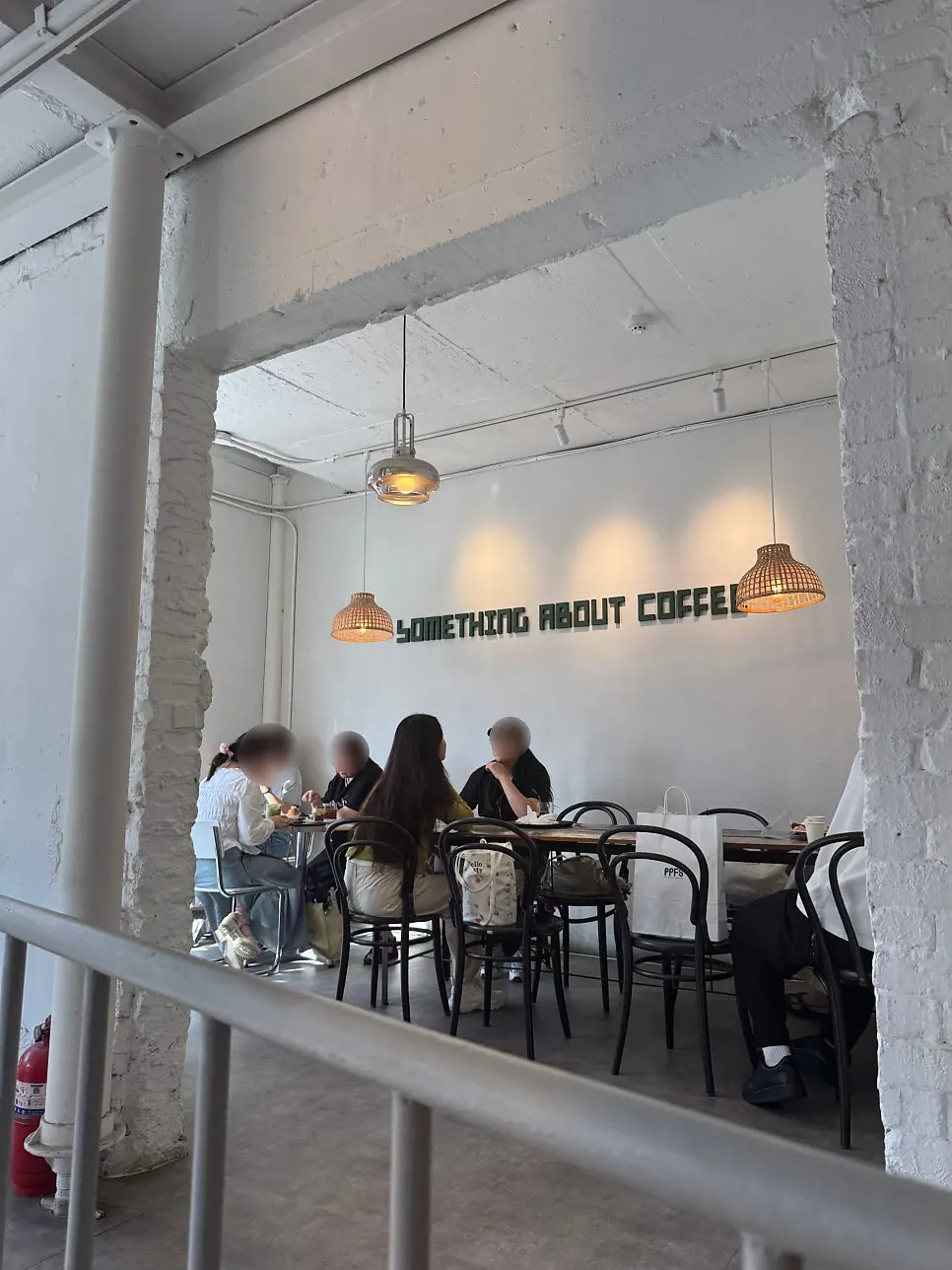 2-person table on the 1st floor of Something About Coffee