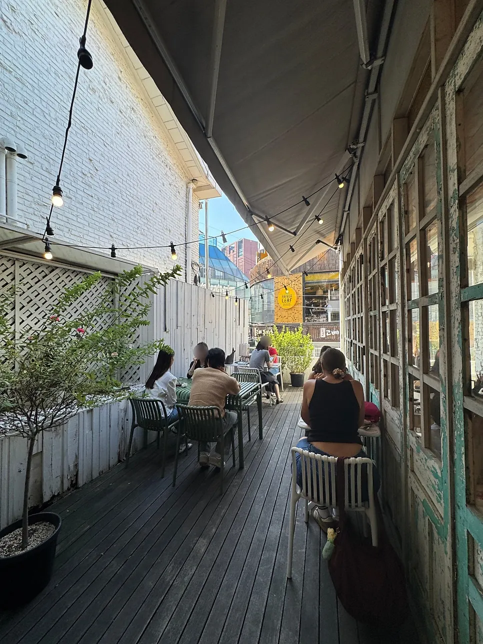 Sunlit interior of the 1st floor at Something About Coffee