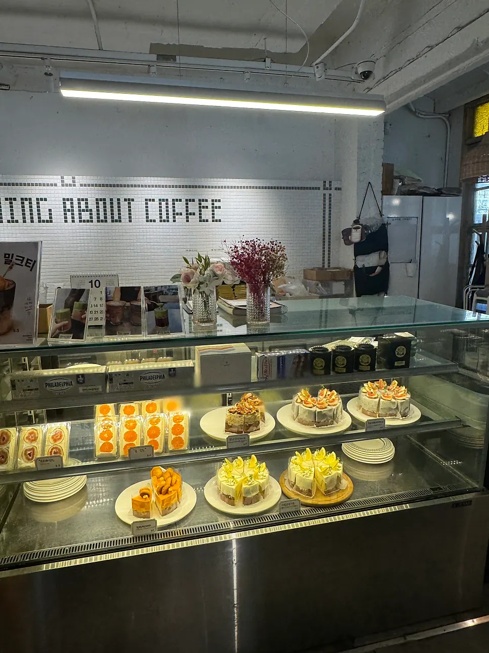 Bakery corner with dessert plates and tongs