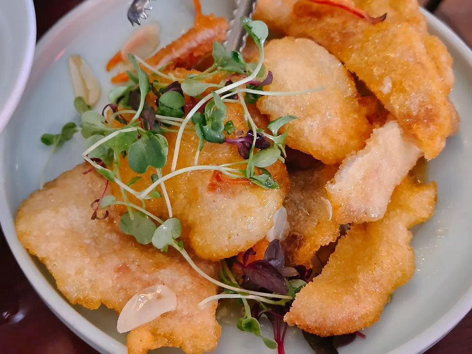 A freshly fried piece of guobaorou