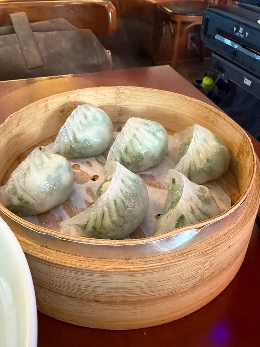 Sujeongdal dumplings served in a steamer basket