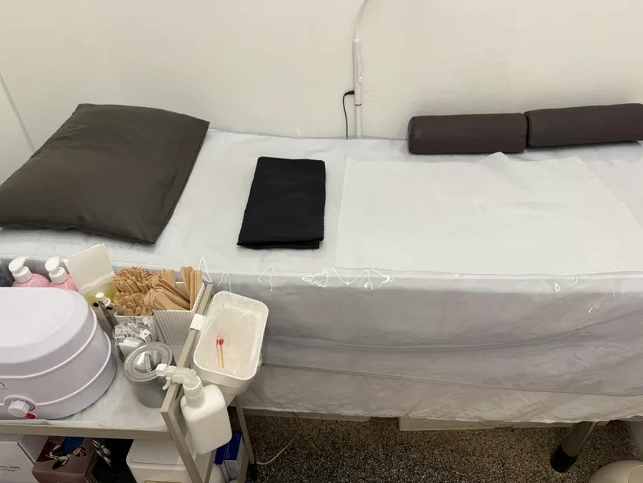 Treatment bed prepared for a Brazilian wax
