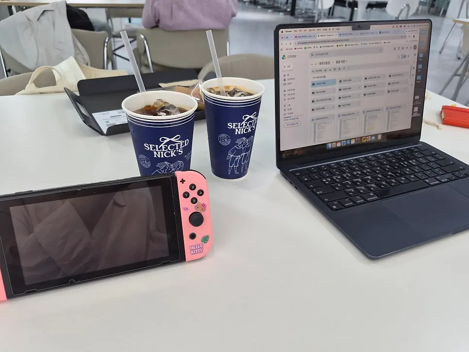 A wide 3rd-floor table set up with a laptop