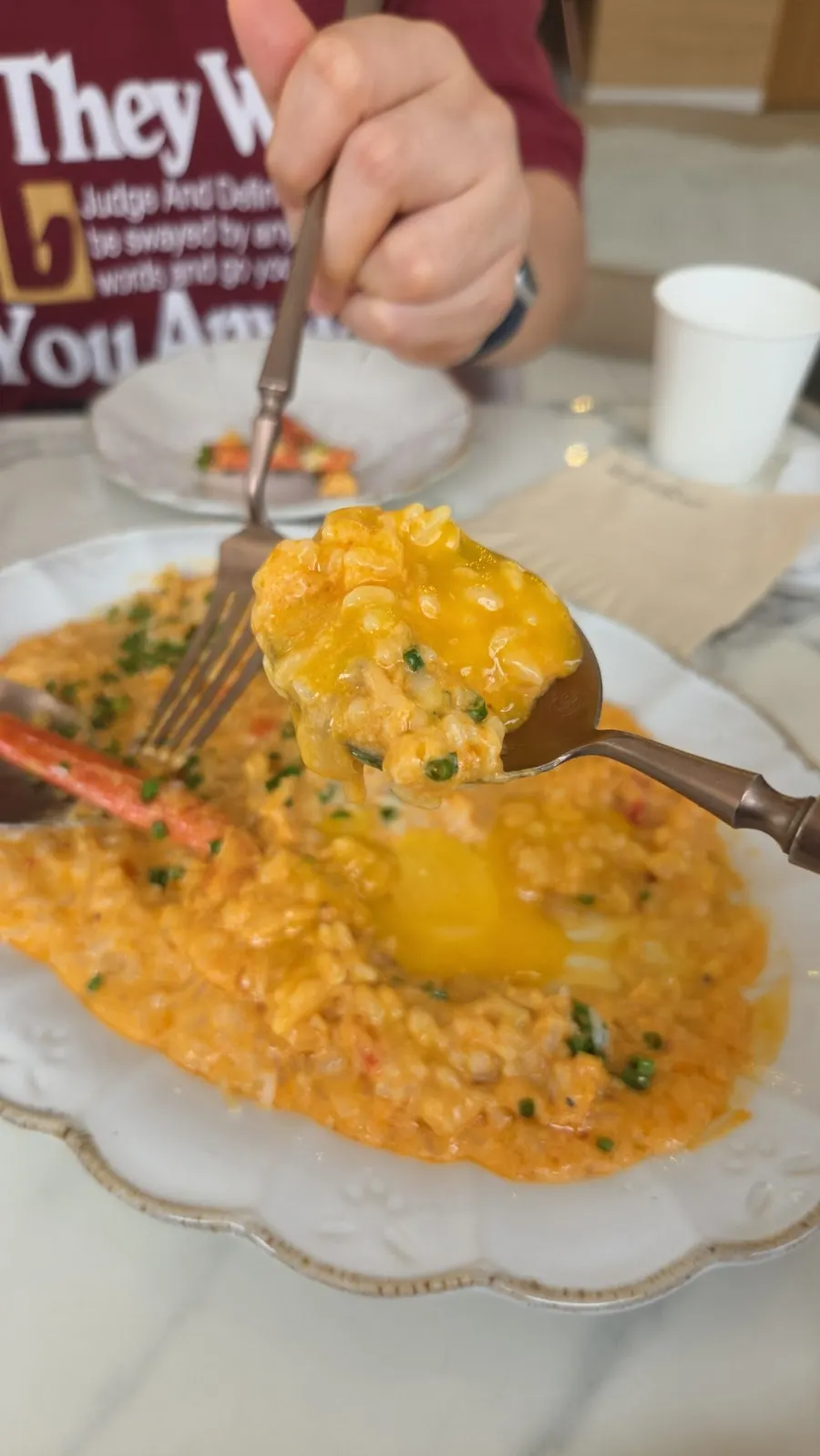 Crab Spicy Risotto mixed with the burst egg yolk
