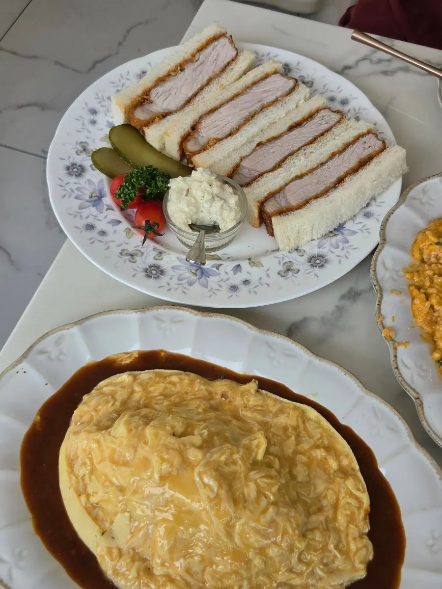 A spoonful taken from the Darak Omelet Rice