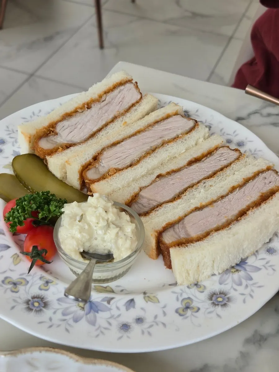 Cross-section of the Katsu Sando showing the thick pork cutlet