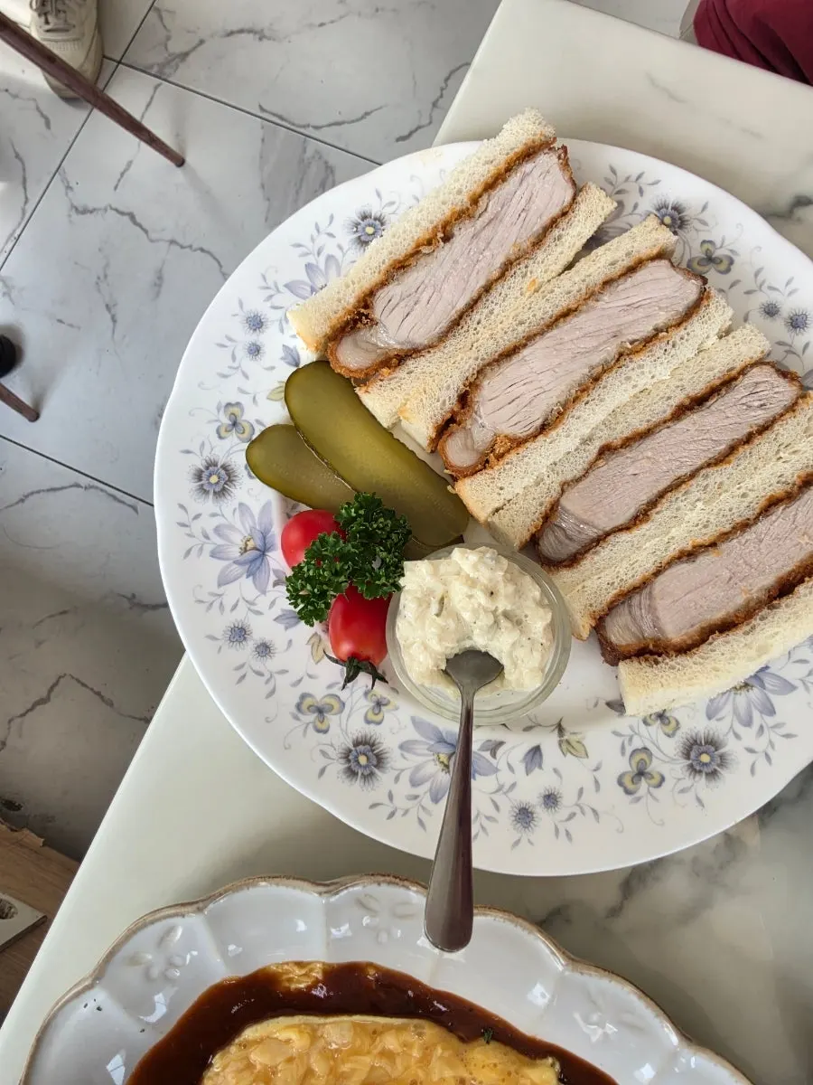 Katsu Sando plated with pickles and tartar sauce