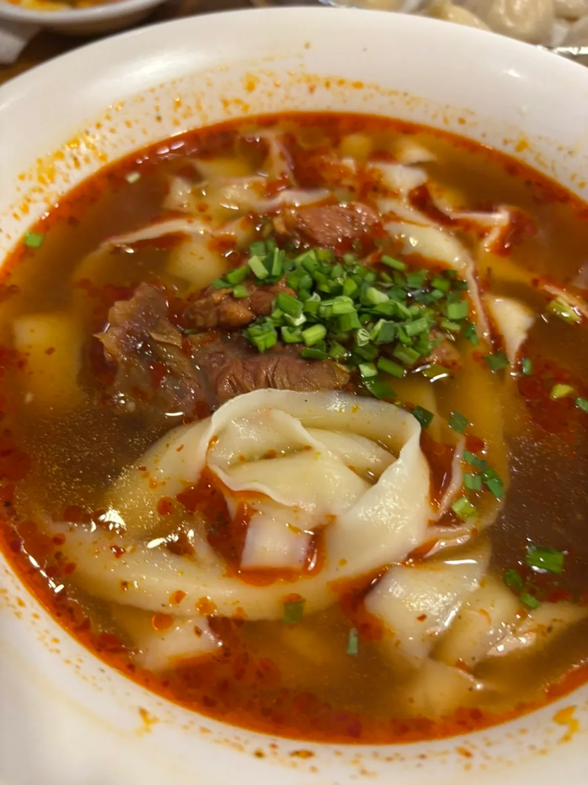 Close-up of knife-cut dao xiao mian noodles