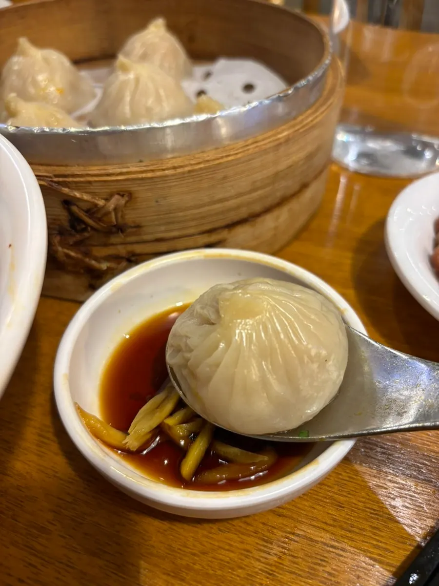 Dao xiao mian lifted with chopsticks