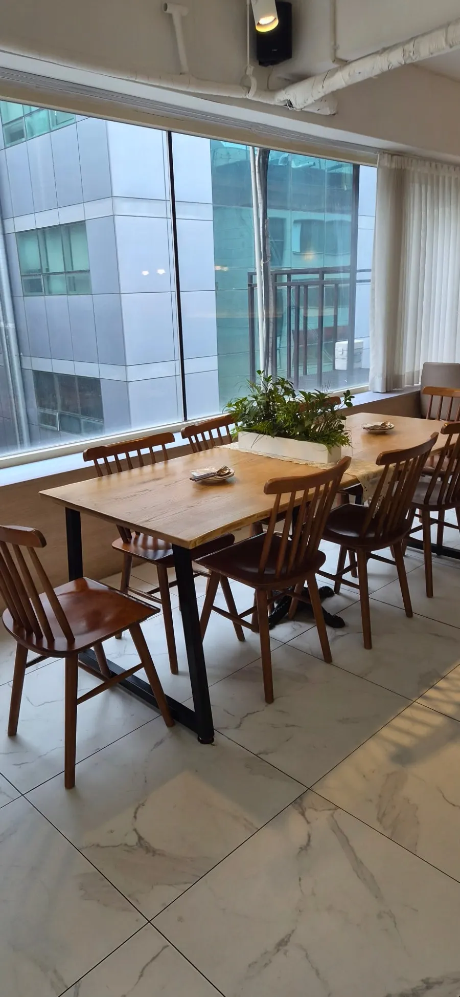Restaurant seating with a view through the windows